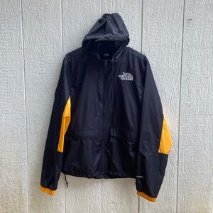 The North Faces Men’s Medium Windwall Windbreaker Jacket with Hood.